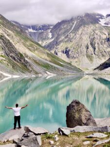 Scenic lake in Swat Valley, Pakistan with crystal clear water and mountains
